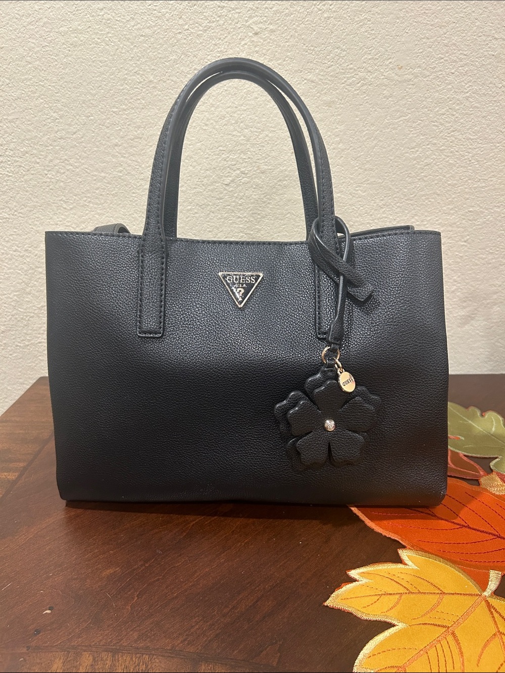 GUESS Black Pebbled Tote with Floral Charm